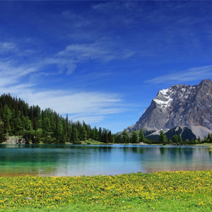 Picture of clear water, trees and mountains. Meant to illustrate abiding in God.