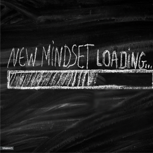 Image says mindset loading with a loading bar like a software loading. Meant to illustrate mind renewal in Jesus